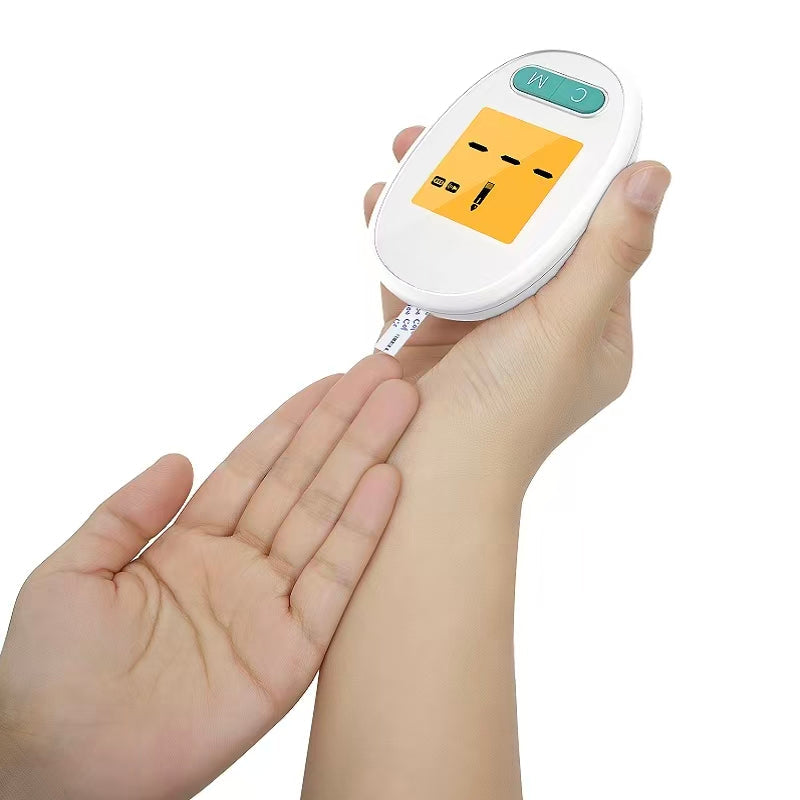 Blood glucose meter being used with a test strip