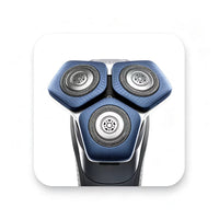 Close-up of three rotary shaving heads on a blue electric shaver